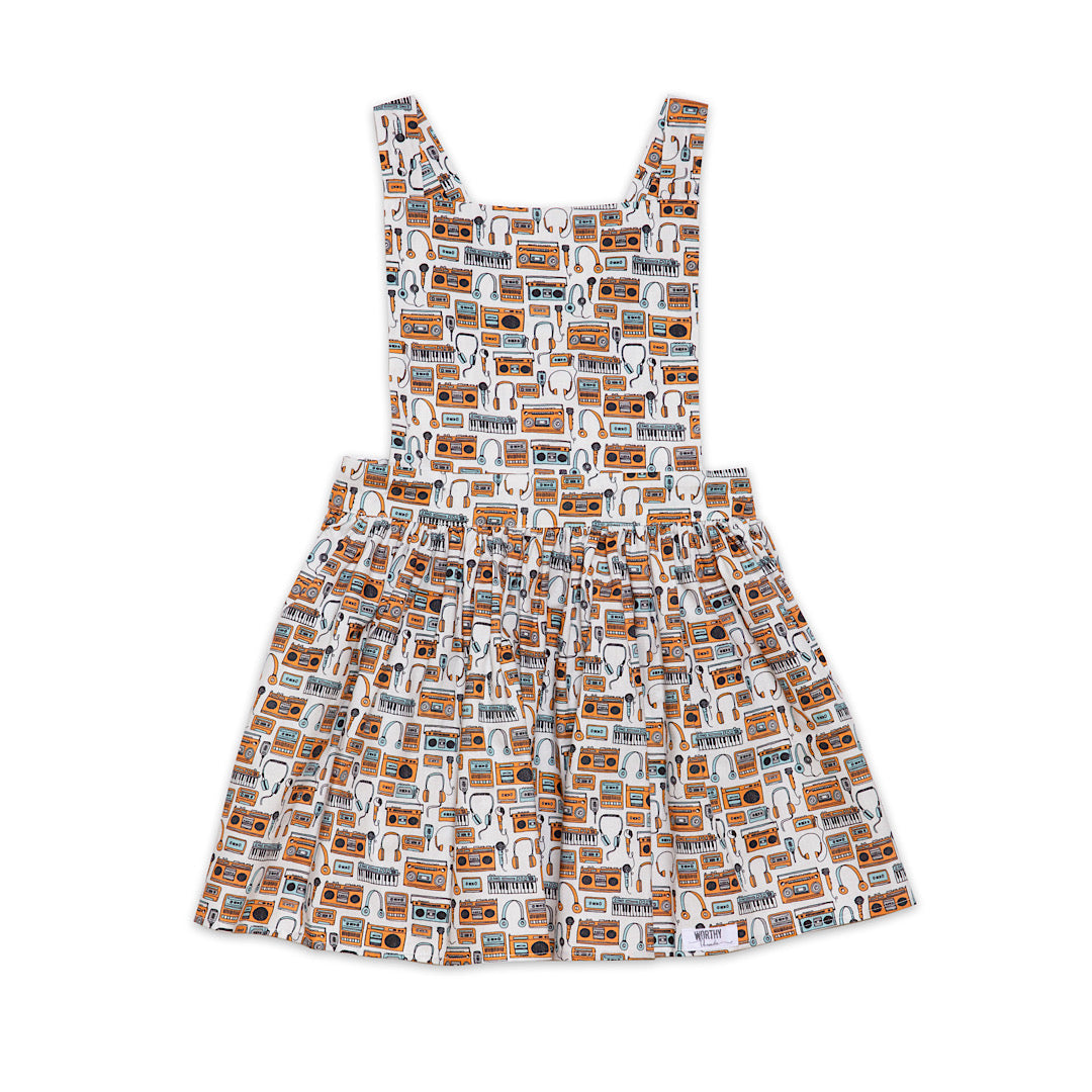 Girls pinafore dress in retro print