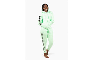 Model in matching hand dyed green checkerboard loungewear set 
