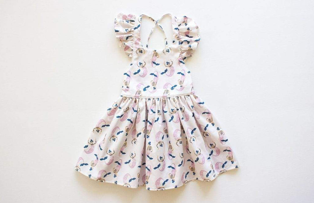 Ruffle sleeve dress in mermaids print: tattooed mermaids on hipster kids clothing